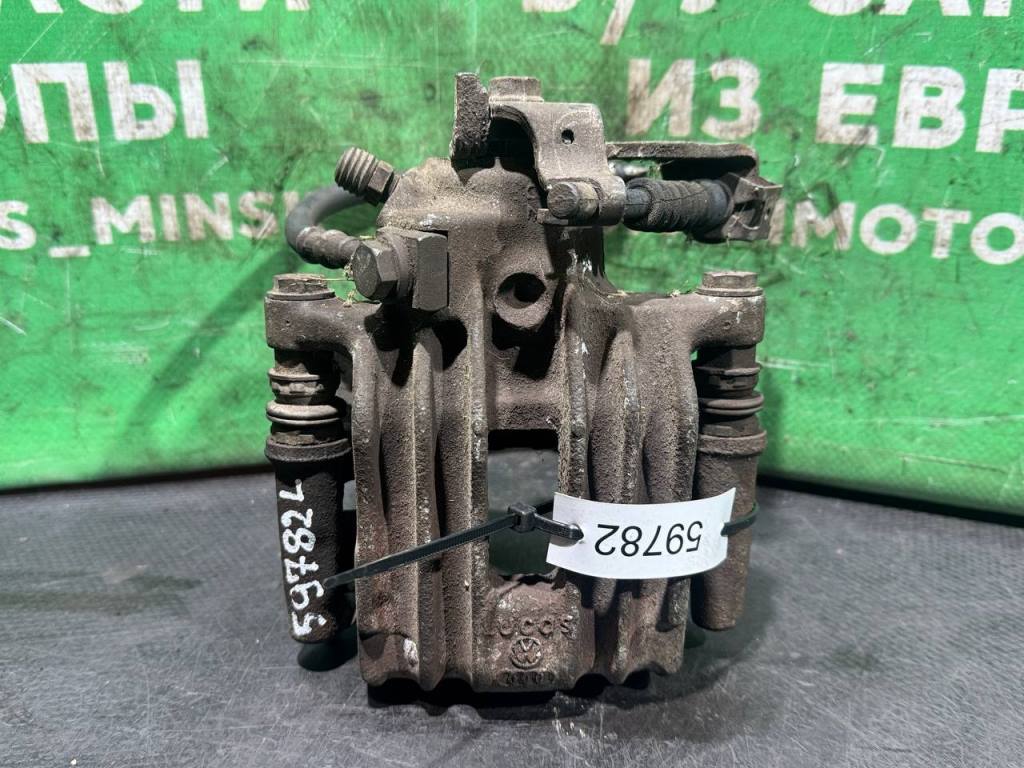 (59982) Суппорт задний левый Skoda Octavia 2000 - фото1